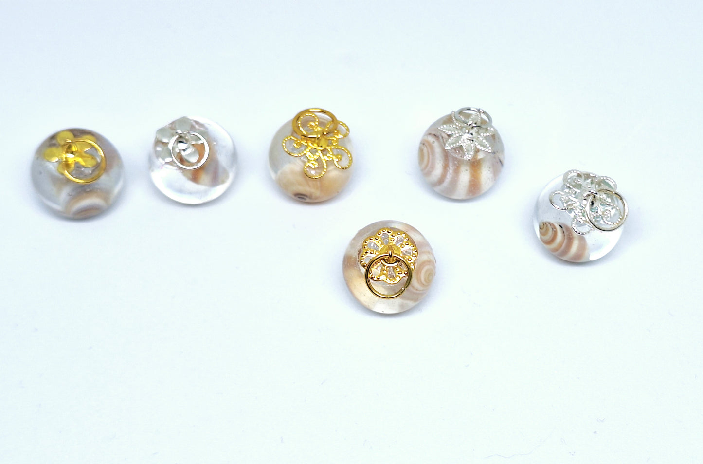Colliers sphères coquillages