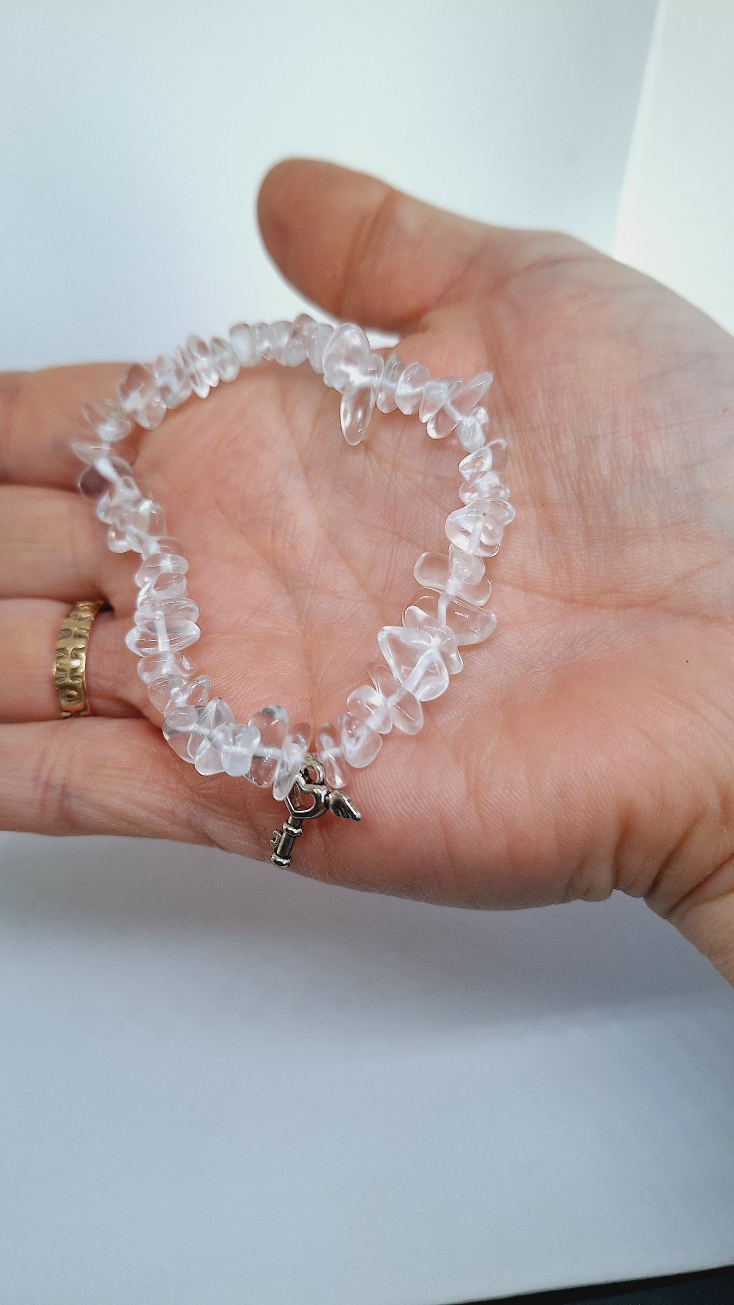 Bracelet quartz / cristal de roche - clé ailée
