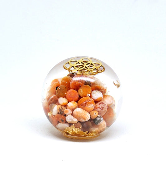 Orgonite Sphère M - Cornaline, graine de vie, or